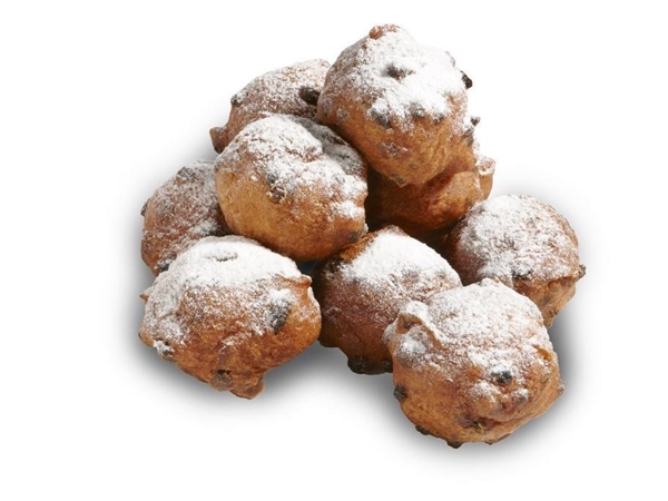 Oliebol gevuld met krenten, rozijnen en appels